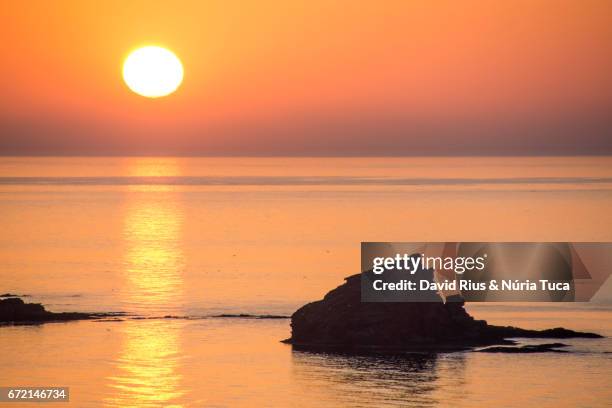 rock formation silhouette at sunset - bahía stock pictures, royalty-free photos & images