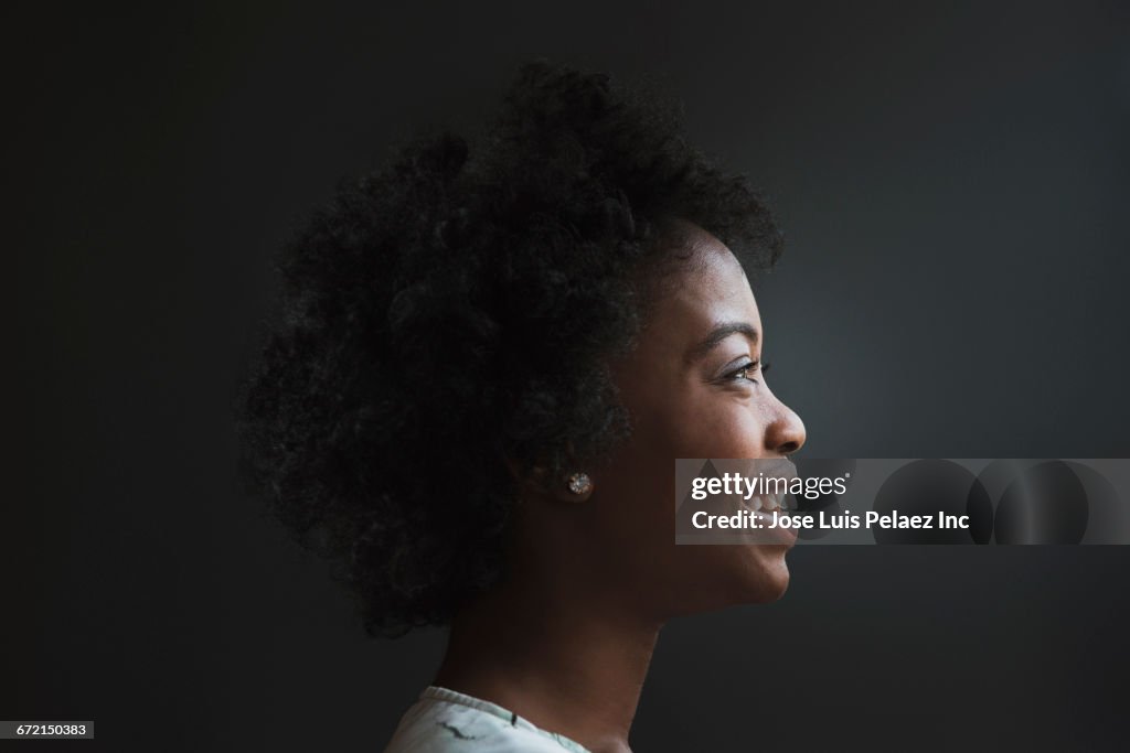 Profile of smiling Black woman