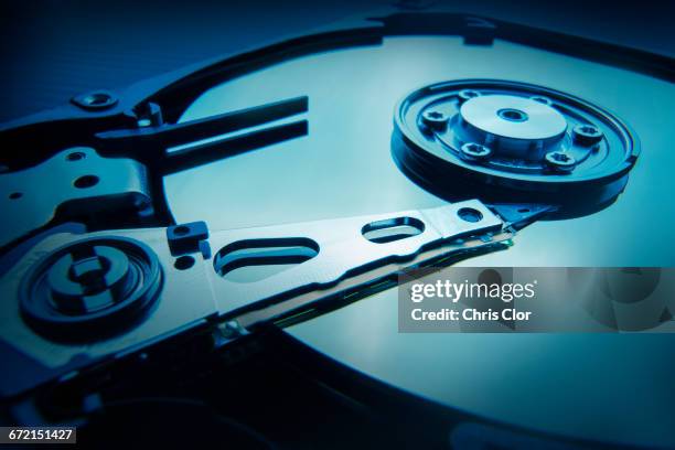 interior of hard disc drive - hard drive stock pictures, royalty-free photos & images