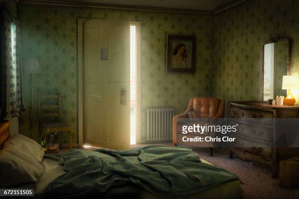 sunshine through open door of motel room - spooky stock pictures, royalty-free photos & images