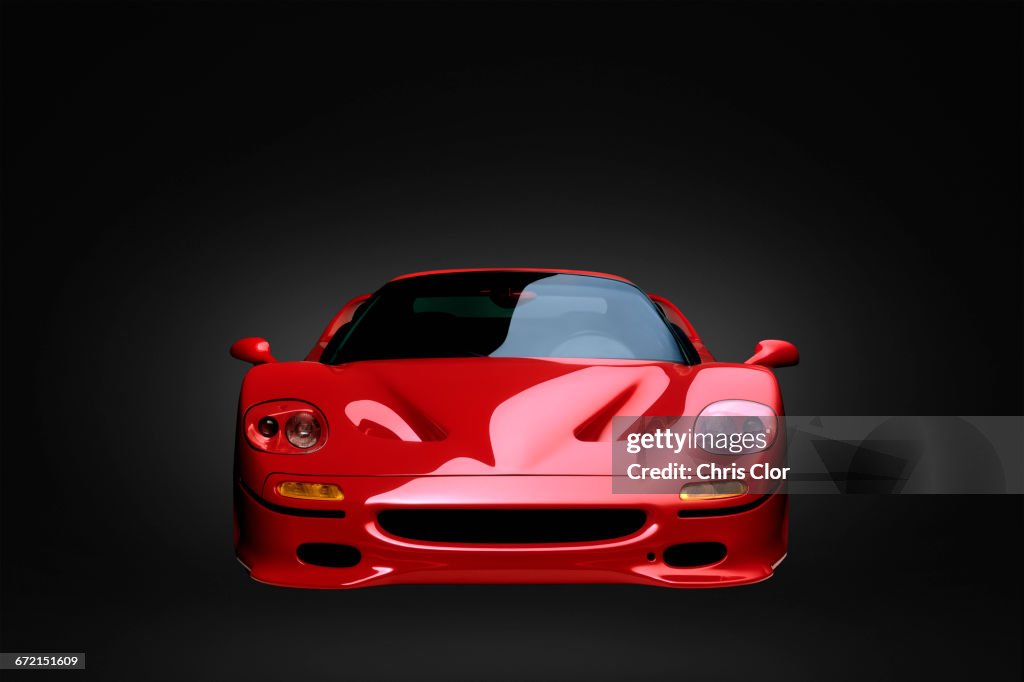 Front view of shiny red sports car