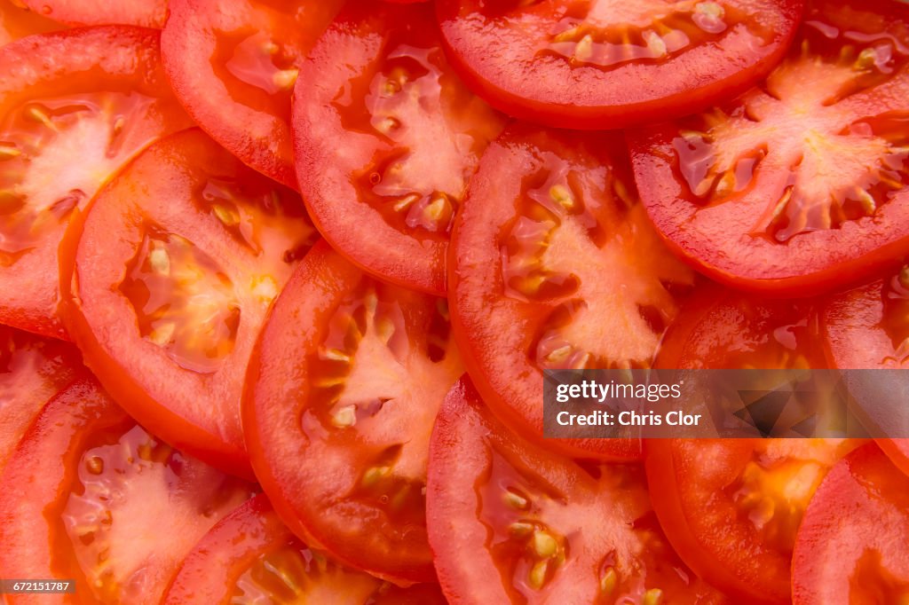 Pile of sliced red tomatoes