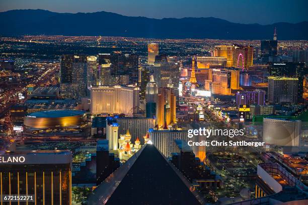 aerial view of illuminated cityscape, las vegas, nevada, united states,  - las vegas aerial stock pictures, royalty-free photos & images