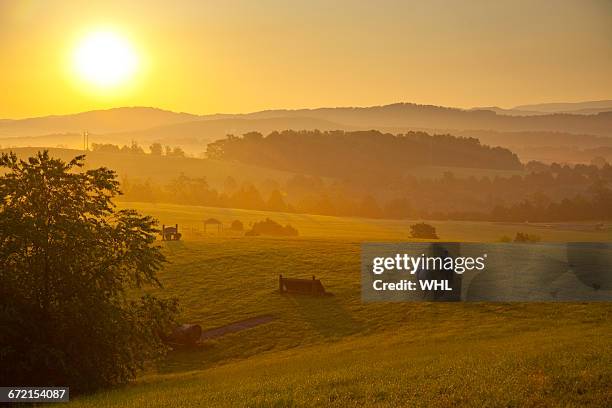 people horseback riding at sunset - shenandoah valley stock pictures, royalty-free photos & images