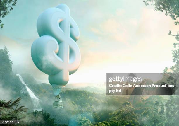 mixed race man floating in dollar sign hot air balloon - one mid adult man only stock illustrations