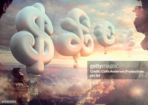 people floating in currency symbol hot air balloons at sunset - yen symbol stock illustrations