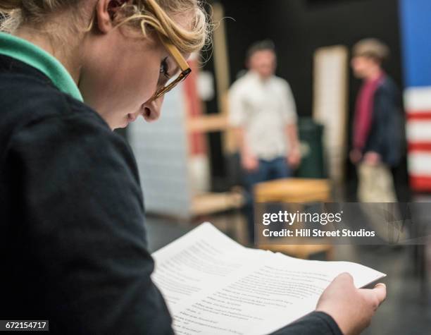 girl reading script in high school drama class - actor script stock pictures, royalty-free photos & images