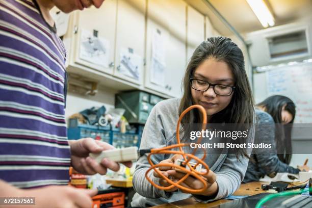 robotics students in workshop - school fair stock pictures, royalty-free photos & images