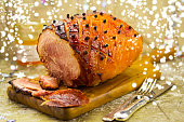 Roasted ham with apricot glaze and cloves