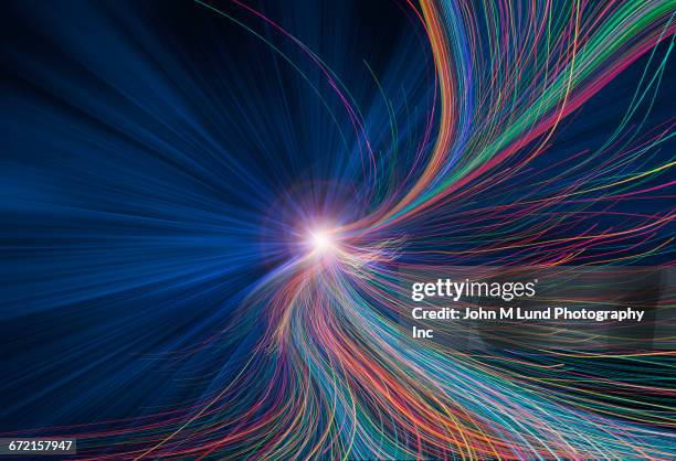 multicolor curving lines flowing from illuminated vanishing point - datenstrom stock-grafiken, -clipart, -cartoons und -symbole