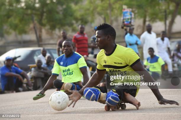 Kano Pillars para-soccer team player advances with the ball during a training session in Kano, northwestern Nigeria, on April 22, 2017. The World...