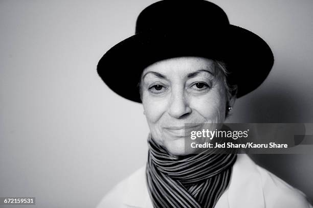 smiling caucasian woman wearing scarf and hat - white collar worker fotografías e imágenes de stock