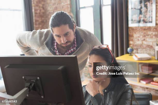 business people using computer - native-american-beards stock pictures, royalty-free photos & images