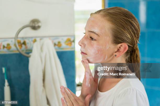 caucasian girl washing face with soap - endast en flicka bildbanksfoton och bilder