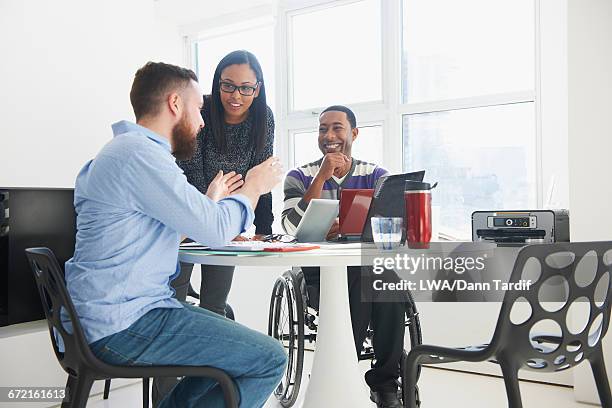 business people using laptops at table - multiculturalism 個照片及圖片檔