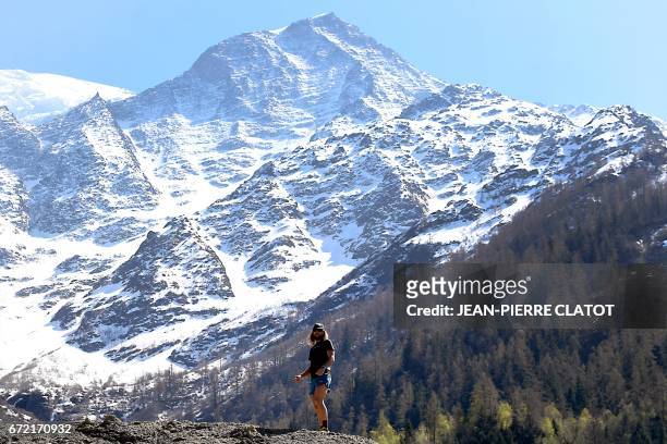 Ultra-trail runner Anton Krupicka poses fpr photographs after taking part in a trainning session on April 14, 2017 in Les Houches by the Mont Blanc...