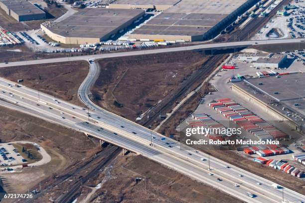 Aerial view of Mississauga city which is part of the GTA. Roads and business installations. The urban settlement has attracted a multicultural...