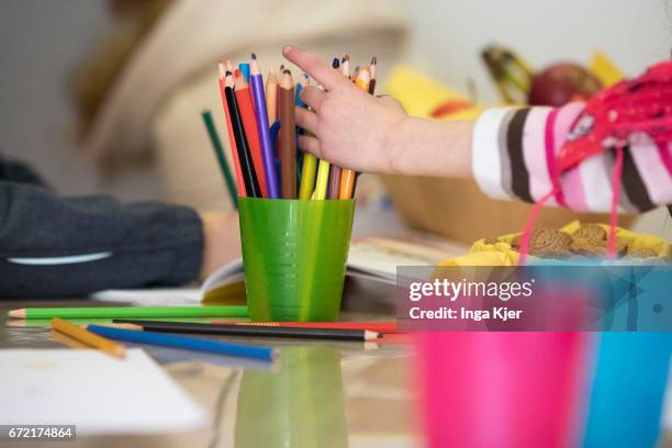 Berlin, Germany Children are drawing in a social Pop-up-Store on April 20, 2017 in Berlin, Germany. Founder of this project is the association...