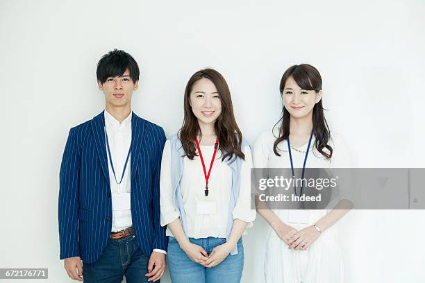 portrait of young businessman and women - three people on white stock pictures, royalty-free photos & images