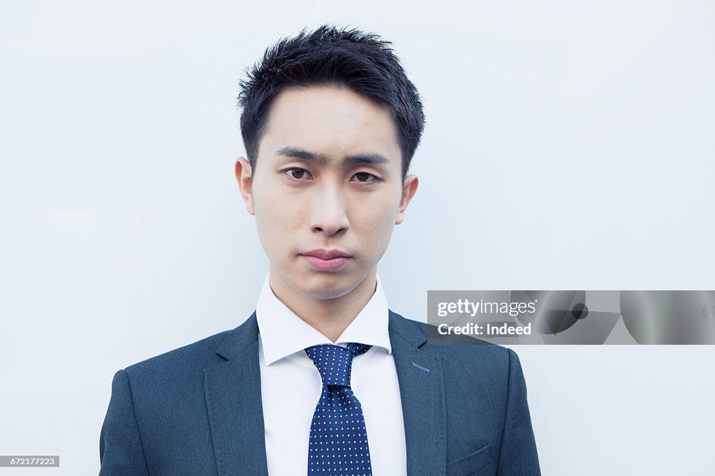 Portrait of serious young businessman