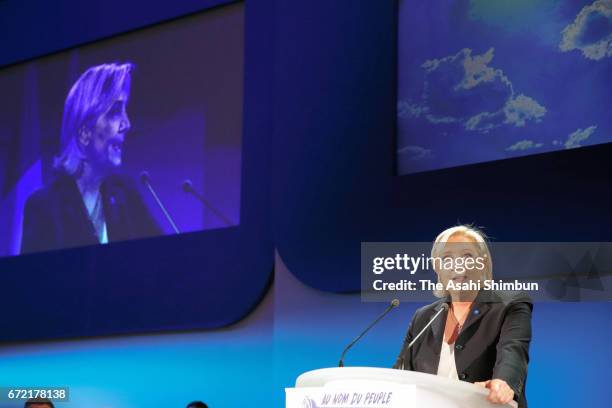 National Front leader Marine Le Pen addresses activists at the Espace Francios Mitterrand on April 23, 2017 in Henin Beaumont, France. According to...