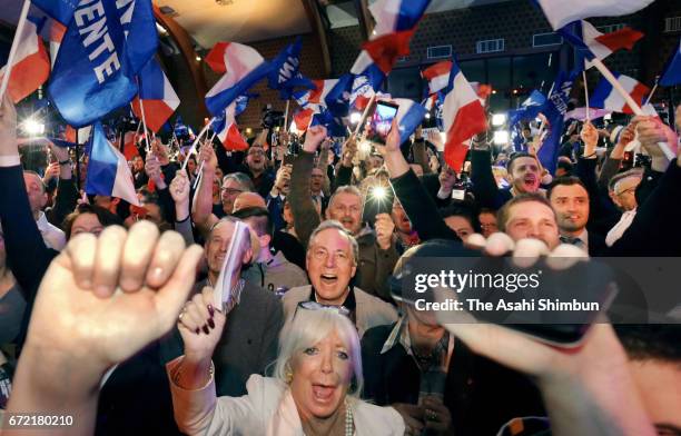 National Front supporters cheer waiting for leader Marine Le Pen at the Espace Francios Mitterrand on April 23, 2017 in Henin Beaumont, France....