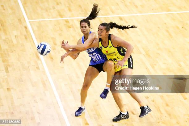 Brooke Watt of the Mystics and Tiana Metuarau of the Pulse compete for the ball during the New Zealand Premiership match between the Pulse and the...