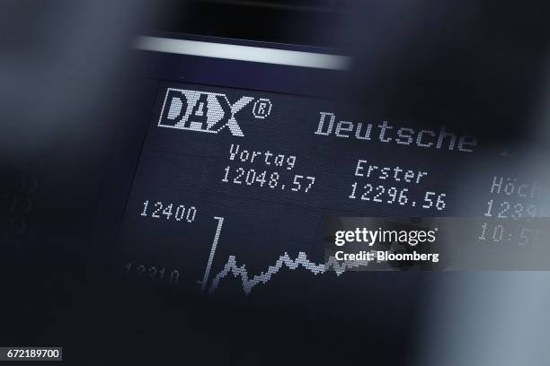 The DAX index curve is displayed inside the Frankfurt Stock Exchange in Frankfurt, Germany, on Monday, April 24, 2017. Frances bonds jumped, with the...