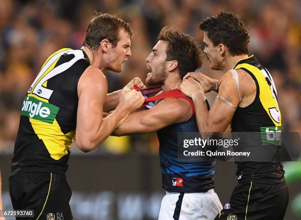 David Astbury of the Tigers and Jack Viney of the Demons wrestle during the round five AFL match between the Richmond Tigers and the Melbourne Demons...