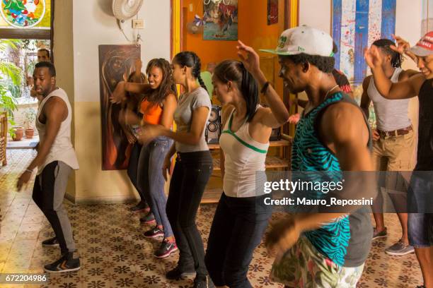 enjoying the dance class at havana, cuba. - salsa music stock pictures, royalty-free photos & images