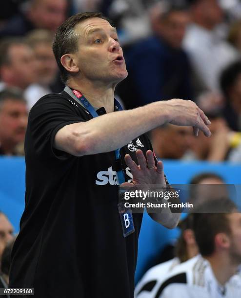 Alfred Gislason, head coach of Kiel reacts during the EHF Champions League Quarter Final first leg match between THW Kiel and Barcelona at the...