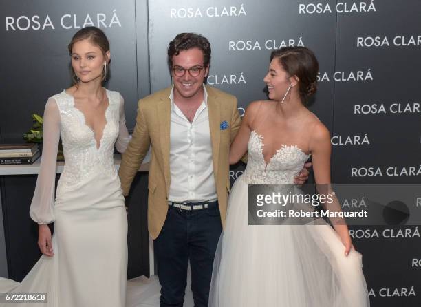 Jordan van der Vyver, Dani Clara and Mariana Downing attend a bridal fitting at the Rosa Clara Bridal studio on April 24, 2017 in Barcelona, Spain.