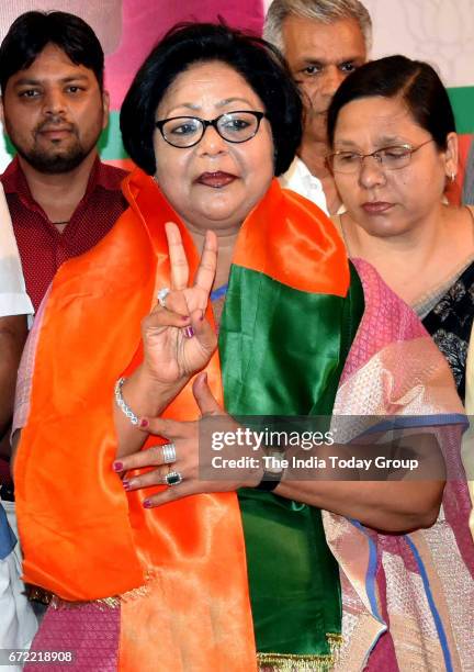 Former DCW chairperson and expelled Congress leader Barkha Singh Shukla making a victory sign after joining BJP in New Delhi.