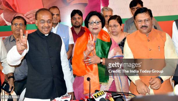 Former DCW chairperson and expelled Congress leader Barkha Singh Shukla making a victory sign after joining BJP in New Delhi.