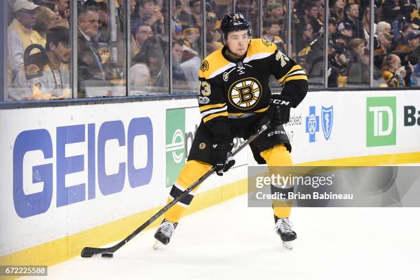 Charlie McAvoy of the Boston Bruins handles the puck against the Ottawa Senators in Game Six of the Eastern Conference First Round during the 2017...