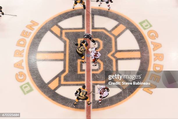 The Boston Bruins face off against the Ottawa Senators in Game Six of the Eastern Conference First Round during the 2017 NHL Stanley Cup Playoffs at...