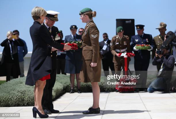 Australian Minister for Foreign Affairs Julie Bishop leaves flowers to the memorial during a ceremony at Commonwealth of Nations Memorial on...