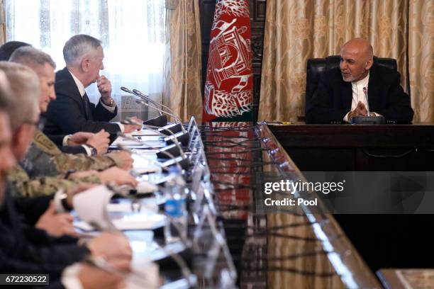 Afghanistan's President Ashraf Ghani meets with U.S. Defense Secretary James Mattis and his delegation at the Presidential Palace on April 24, 2017...