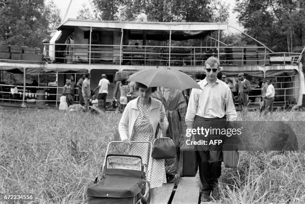 British and American nationals arrive by boat in Lobe, Cameroon, on October 24 after their evacuation from Calabar, Biafra, after the Nigerian...