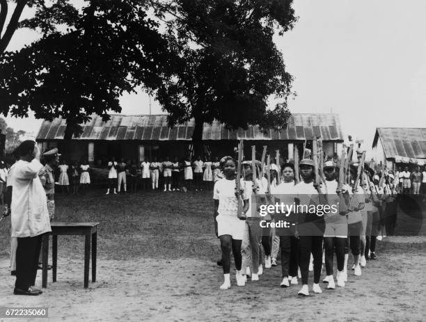 Young militia women of the civil defence parade during a military training on August 17, 1967 in Enugu, capital of the new Republic of Biafra, during...