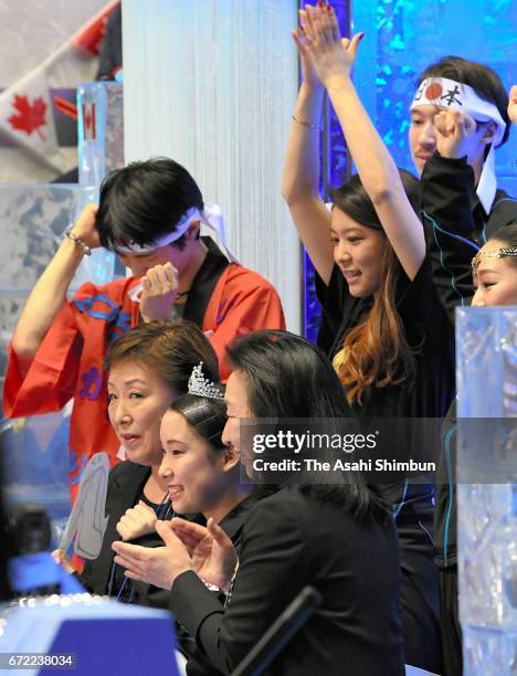 Mai Mihara of Japan and her fellow skaters celebrate her score after competing the Ladies Singles Free Skating during day three of the ISU World Team...