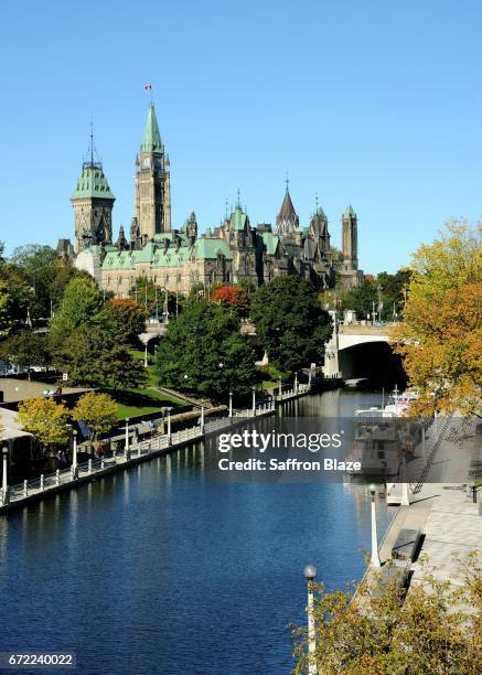 rideau canal and parliament hill, autumn - parliament hill canada stock pictures, royalty-free photos & images