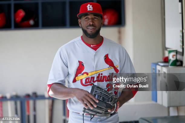 Dexter Fowler of the St. Louis Cardinals walks through the dugout before the game against the Milwaukee Brewers at Miller Park on April 23, 2017 in...
