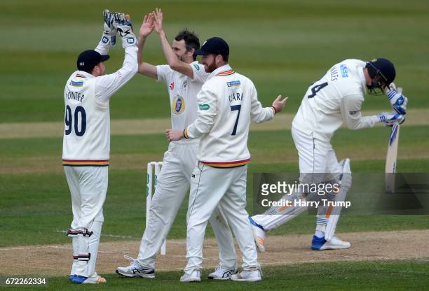 Graham Onions of Durham celebrates the wicket of Craig Miles of Gloucestershire during the Specsavers County Championship Division Two match between...