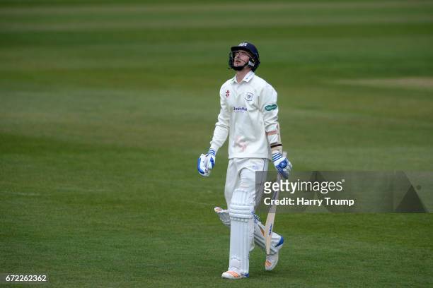 Craig Miles of Gloucestershire walks off after being dismissed during the Specsavers County Championship Division Two match between Gloucestershire...