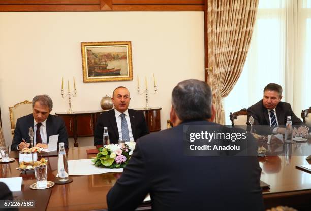 Turkish Foreign Minister Mevlut Cavusoglu meets with General Coordinator of the Syrian opposition's High Negotiating Committee, Riad Hijab at Foreign...