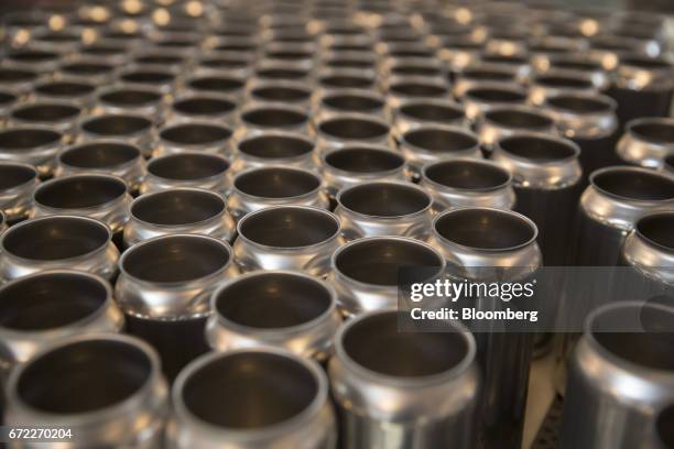Empty beer cans sit before being filled by an Iron Heart Canning Co. Mobile canning machine at the Other Half Brewing Co. In the Gowanus neighborhood...