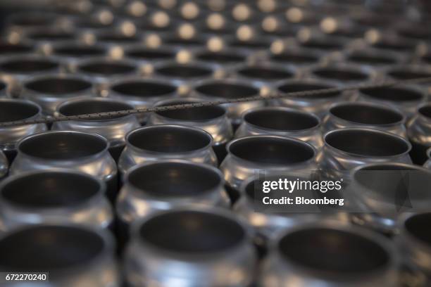 Empty beer cans sit before being filled by an Iron Heart Canning Co. Mobile canning machine at the Other Half Brewing Co. In the Gowanus neighborhood...