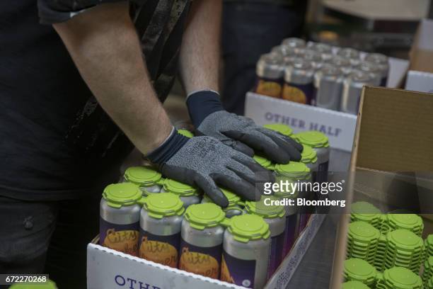 Cans of City Slicker IPA sit at the Other Half Brewing Co. In the Gowanus neighborhood in the Brooklyn borough of New York, U.S., on Tuesday, April...