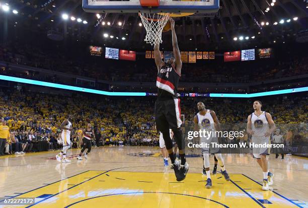 Maurice Harkless of the Portland Trail Blazers slam dunks the ball against the Golden State Warriors in the third quarter during Game One of the...